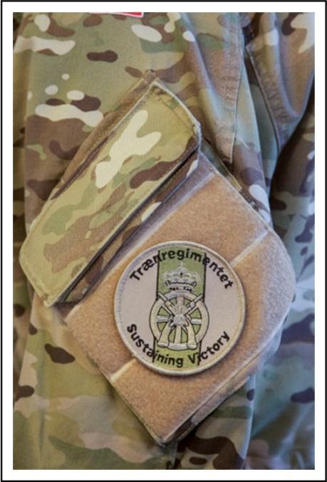 Ærmemærker til uniformssystem MTS M/11. Formål. Ærmemærket har til formål på MTS M/11 uniform at angive personellets tilhørsforhold til en enhed, skole, institution eller lignende. Beskrivelse.